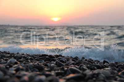 Sunset on the beach / Beach on the island of Kos (Greece). Aegean sea.