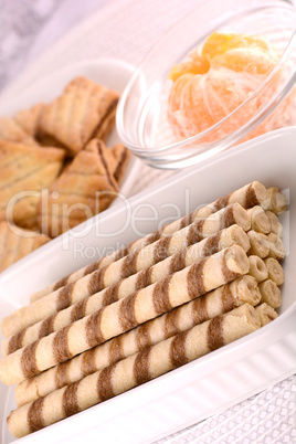 sweet cake on white plate with lemon