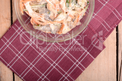 Fresh salad on glass bowl