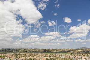 Contemporary Neighborhood and Majestic Clouds