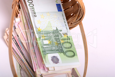 european money on wooden basket, dollars, euro