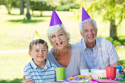 Happy grandparents with their grandson