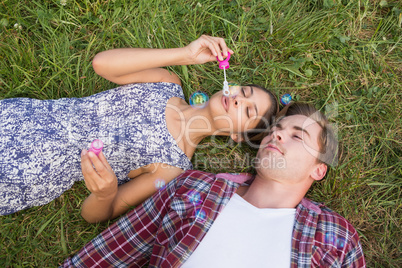 Couple relaxing in the park Couple relaxing in the park