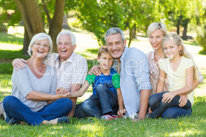 Happy family smiling at the camera