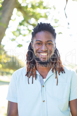 Happy young man in the park