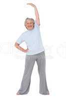 Senior woman stretching her arms