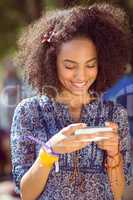 Pretty hipster looking at her selfie