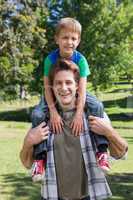 Father and son having fun in the park