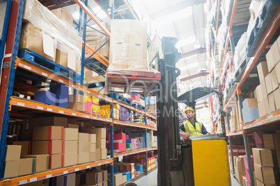 Focused driver operating forklift machine