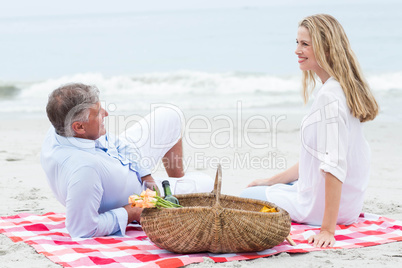 Happy couple having picnic