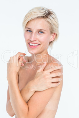 Peaceful woman touching her neck