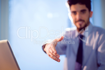 Businessman offering to shake hands