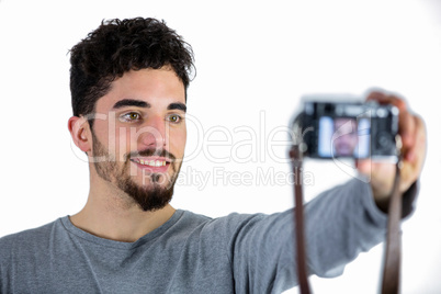 Casual man taking a selfie