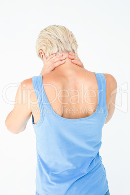 Casual woman suffering from neck ache