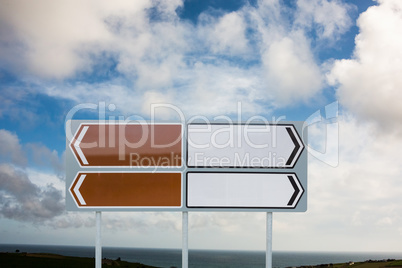 Signpost arrows with copy space