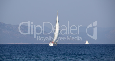 White sailboat at sea