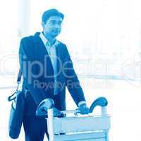 Man walking with airport trolley