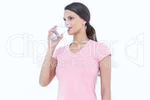 Pretty woman drinking glass of water