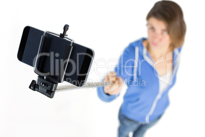 Casual brunette taking a selfie