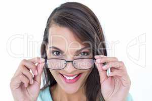 Pretty woman holding her eyeglasses