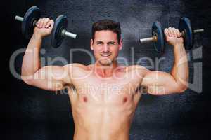 Composite image of bodybuilder lifting dumbbells