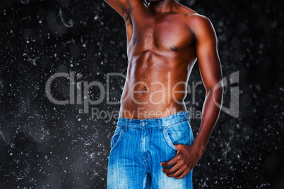 Composite image of mid section of a shirtless muscular man