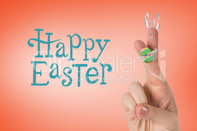 Composite image of fingers as easter bunny