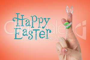 Composite image of fingers as easter bunny