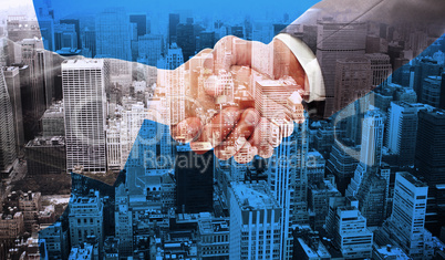 Composite image of handshake between two business people