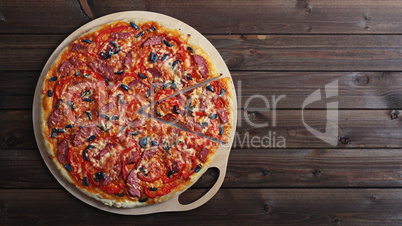 pizza on a wooden table