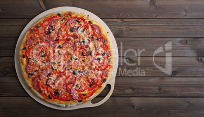 pizza on a wooden table