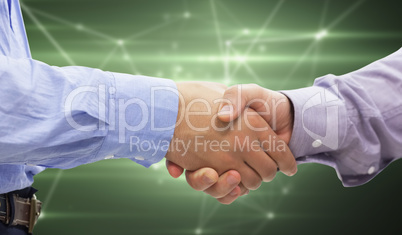 Composite image of two men shaking hands