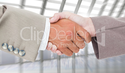 Composite image of side view of business peoples hands shaking