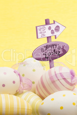 Composite image of easter egg hunt sign