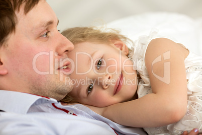 Lovely girl close to beloved father