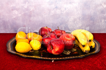 Fruit / Still life of fruit: apples, pineapple, tangerines, pomegranates.