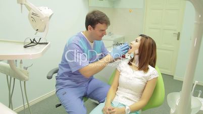 Patient examination at dental clinic