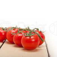 fresh cherry tomatoes on a cluster