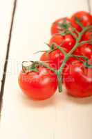 fresh cherry tomatoes on a cluster