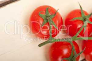 fresh cherry tomatoes on a cluster