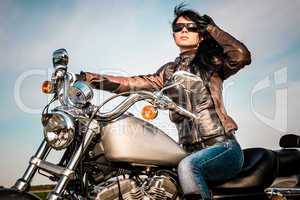 Biker girl on a motorcycle