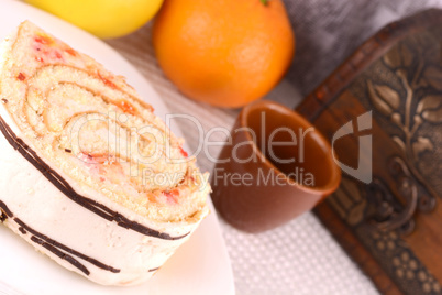 sweet cake on white plate with fruits