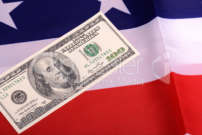 dollars on american flag