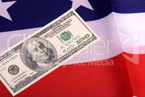 dollars on american flag