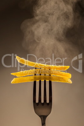 French fries on a fork