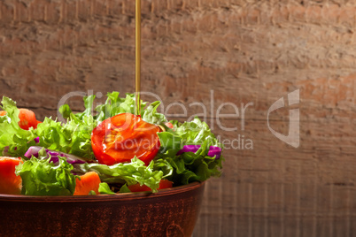 Fresh salade on wooden background