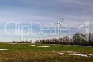 Windmill generator in wide yard