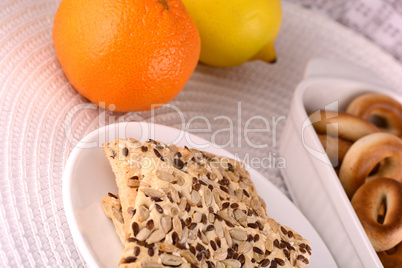 sweet cake on white plate and fruits