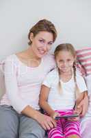 Mother and daughter using tablet pc