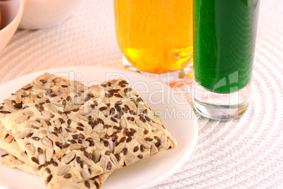sweet cake on white plate with fresh juice